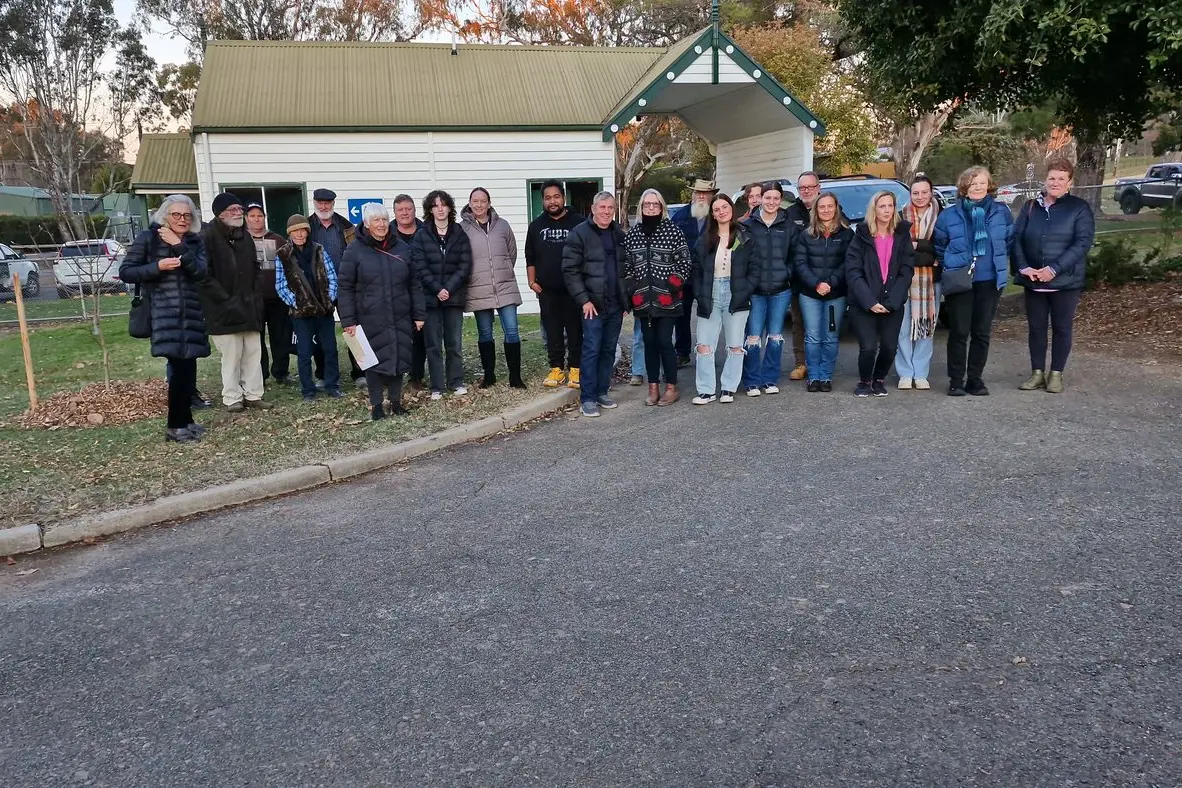 START THE WALK: Visitors gathered at the gate of the Mansfield Cemetery before setting off on the first of the history \\u2018walk and talk\\u2019 tours recently. \\n\\n