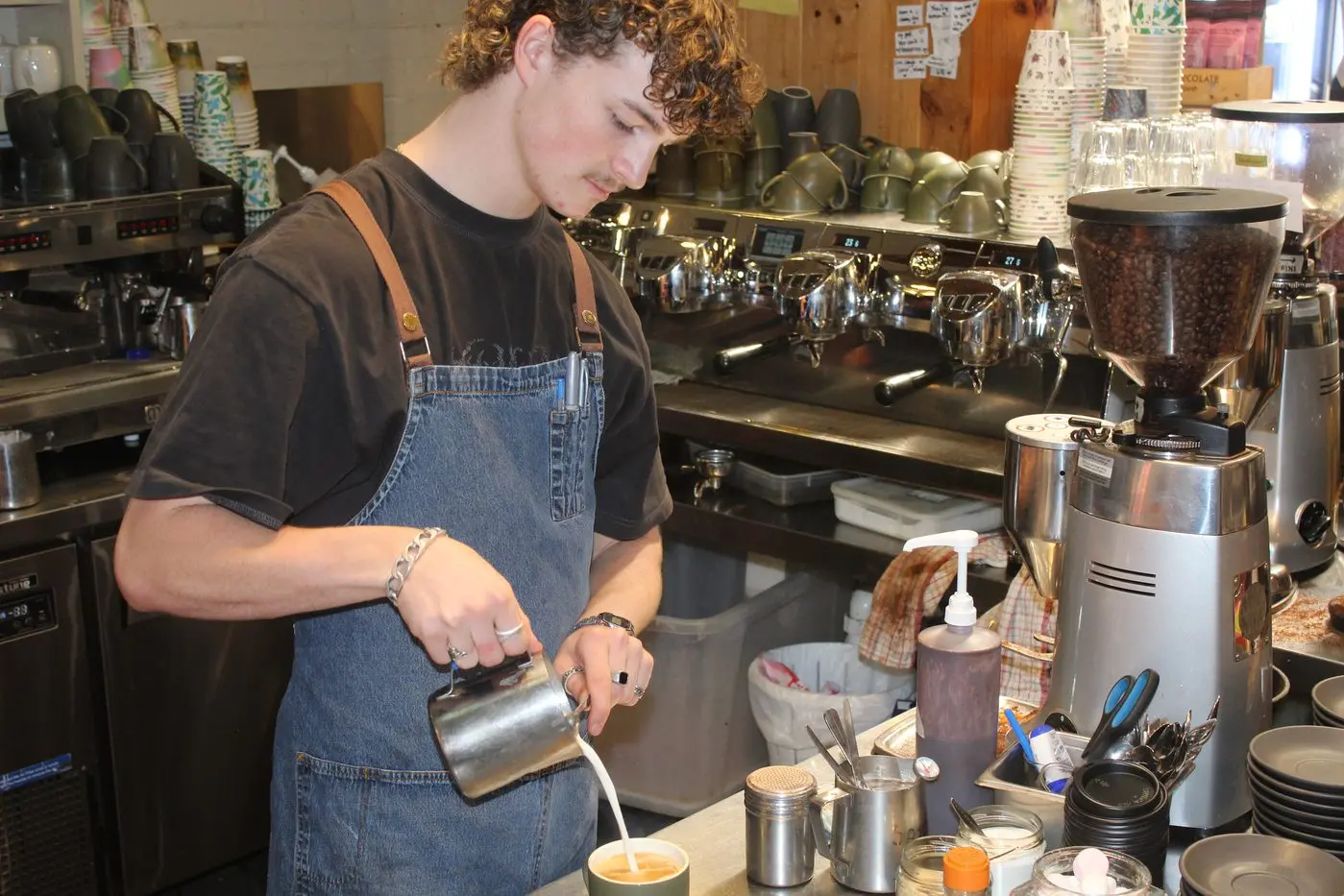 ARTIST AT WORK: Zac Appleby of Mansfield Produce Store. PHOTOS: Mike Smith