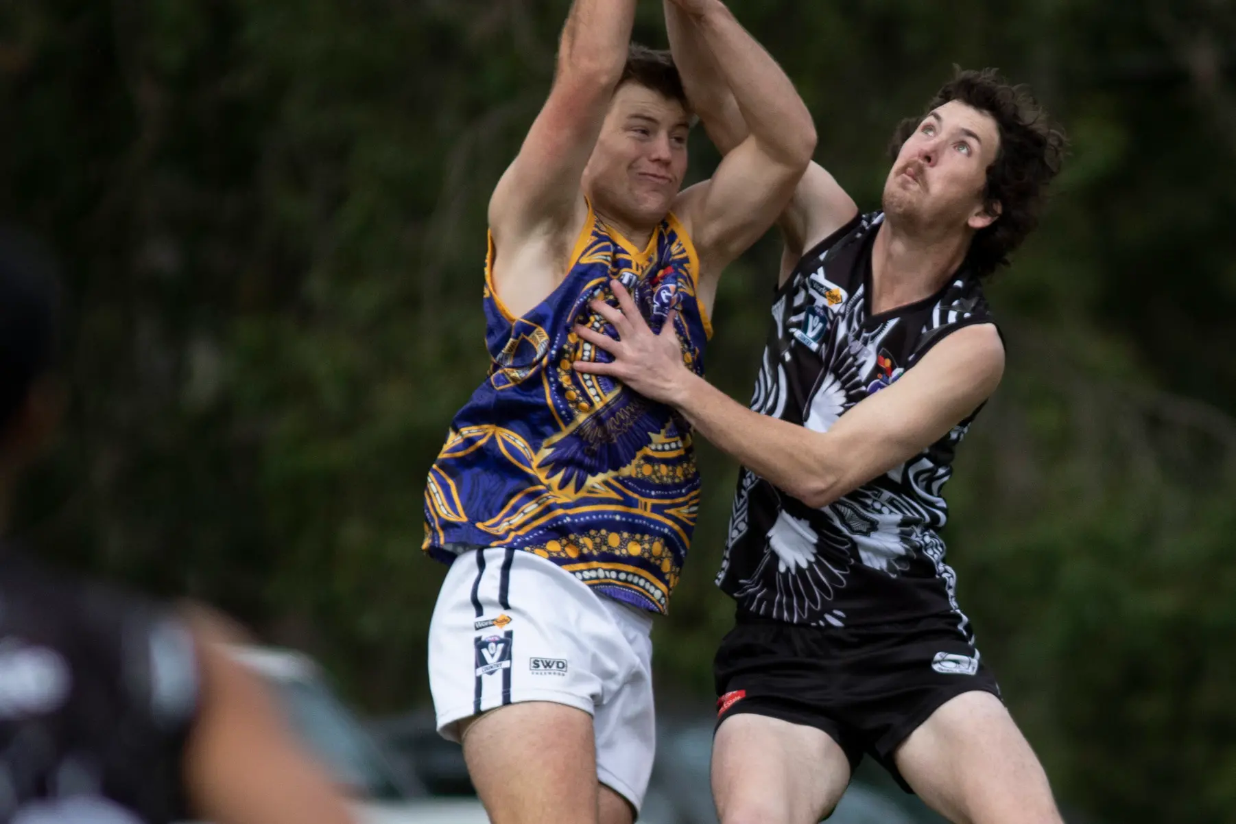<p>AERIAL CONTEST: Jye Bjork attempts a high mark against a stronger Eagles opponent. </p>\\n